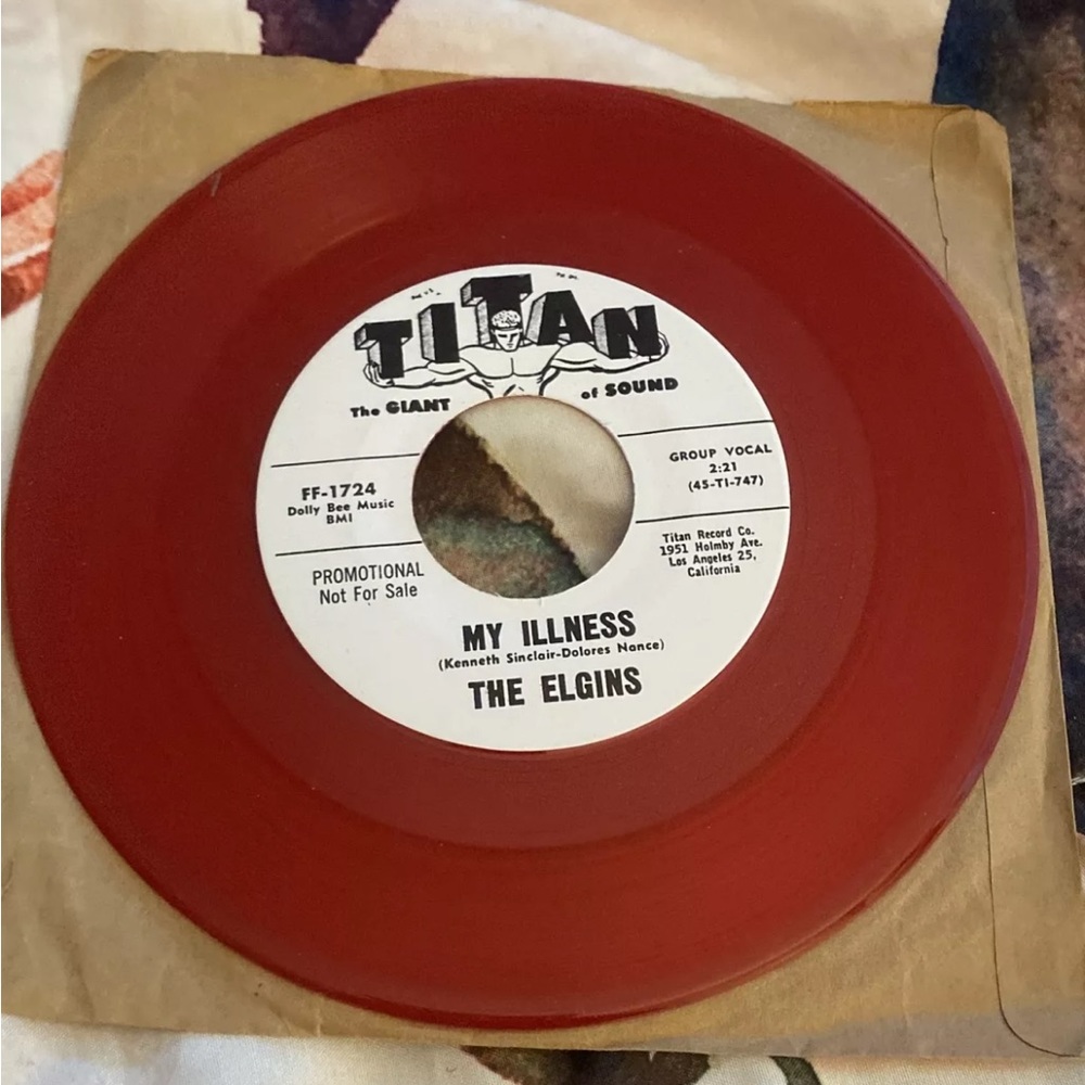The Elgin’s Extra! Extra! / My Illness 45 Rpm Red Vinyl Titan Record Repro